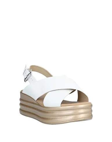 https://images.styletyx.com/images/white-leather-sandals-phil-gatier-by-repo-1322515_2.webp