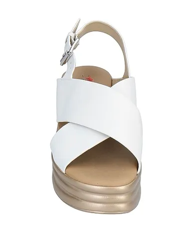 https://images.styletyx.com/images/white-leather-sandals-phil-gatier-by-repo-1322515_4.webp