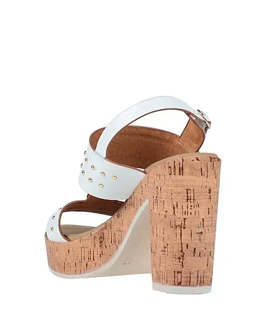 https://images.styletyx.com/images/white-leather-sandals-phil-gatier-by-repo-587202_3.webp