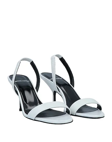 https://images.styletyx.com/images/white-leather-sandals-pierre-hardy-2377480_2.webp