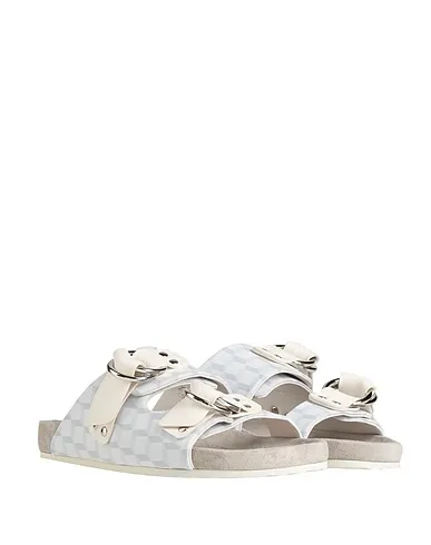 https://images.styletyx.com/images/white-leather-sandals-pierre-hardy-873312838_2.webp