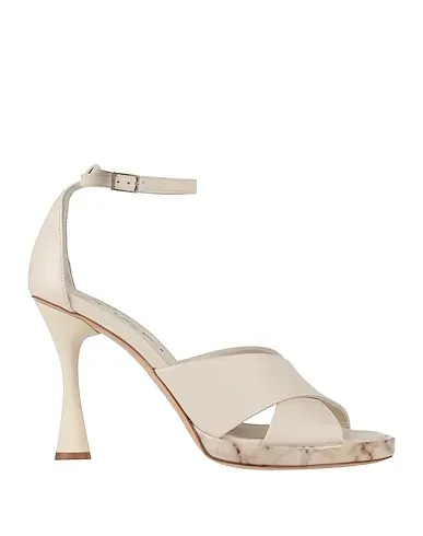 https://images.styletyx.com/images/white-leather-sandals-tiffi-13195277_1.webp