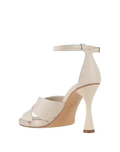 https://images.styletyx.com/images/white-leather-sandals-tiffi-13195277_3.webp