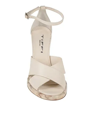 https://images.styletyx.com/images/white-leather-sandals-tiffi-13195277_4.webp
