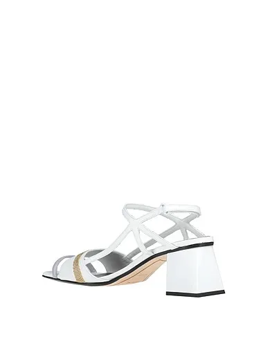 https://images.styletyx.com/images/white-leather-sandals-tipe-e-tacchi-2609062_3.webp