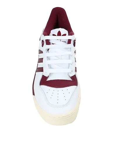 https://images.styletyx.com/images/white-leather-sneakers-rivalry-low-86-w-shoes-adidas-13139501_4.webp