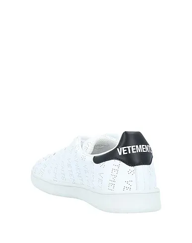 https://images.styletyx.com/images/white-leather-sneakers-vetements-2615819_3.webp