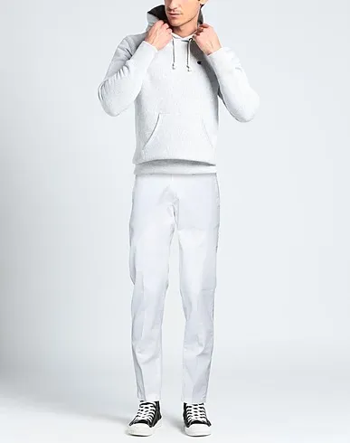 https://images.styletyx.com/images/white-plain-weave-casual-pants-martin-zelo-13547845_2.webp