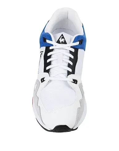 https://images.styletyx.com/images/white-techno-fabric-sneakers-lcs-r1000-le-coq-sportif-1680943_4.webp