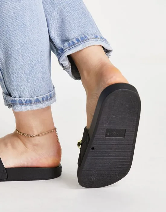 https://images.styletyx.com/images/wide-fit-finery-quilted-studded-sliders-in-black-asos-design-1984655_2.webp