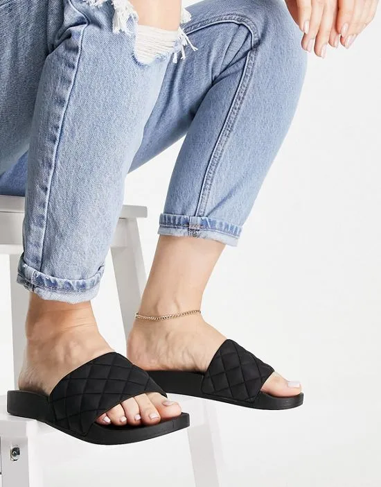 https://images.styletyx.com/images/wide-fit-flare-quilted-sliders-in-black-asos-design-1736862_2.webp