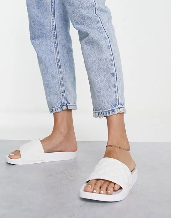https://images.styletyx.com/images/wide-fit-flare-quilted-sliders-in-white-asos-design-1739365_2.webp