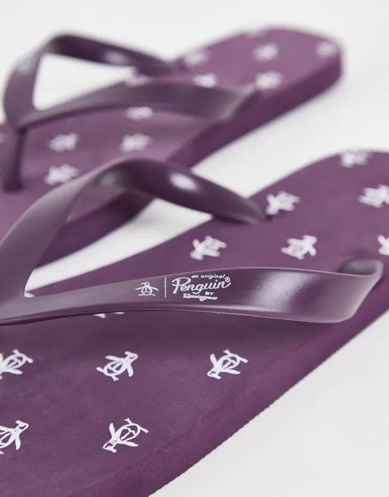 https://images.styletyx.com/images/wide-fit-flip-flops-in-plum-original-penguin-1888526_2.webp
