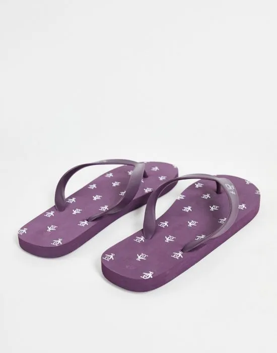 https://images.styletyx.com/images/wide-fit-flip-flops-in-plum-original-penguin-1888526_4.webp