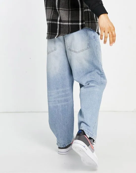 https://images.styletyx.com/images/wide-leg-balloon-fit-jeans-in-mid-blue-bershka-1833893_2.webp