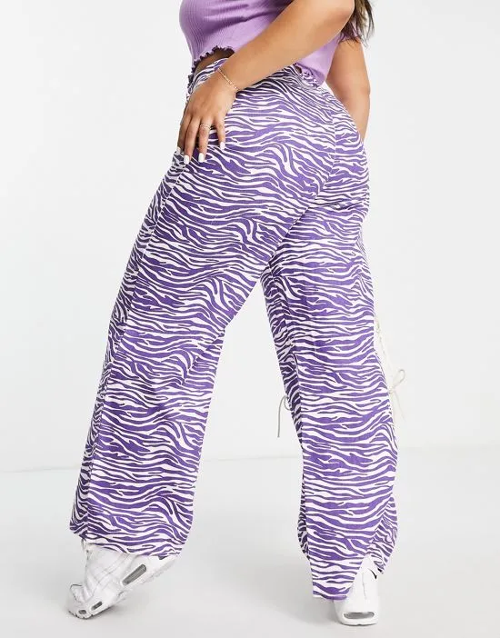 https://images.styletyx.com/images/wide-leg-pants-in-lilac-zebra-missguided-plus-2505310_2.webp