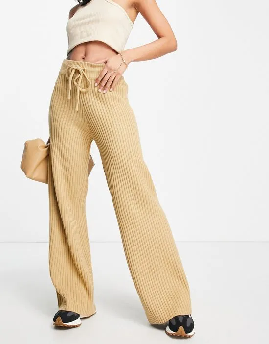 https://images.styletyx.com/images/wide-ribbed-knit-pants-in-camel-part-of-a-set-pretty-lavish-1904057_3.webp