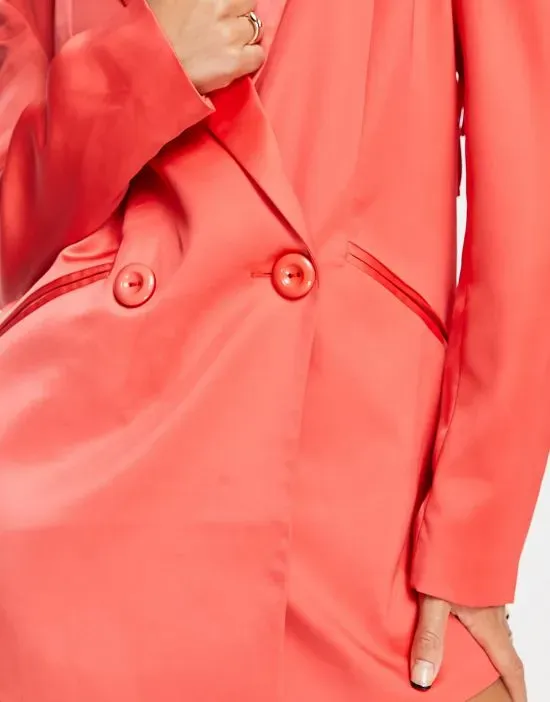 https://images.styletyx.com/images/wide-shoulder-cut-out-blazer-dress-in-grenadine-coral-annorlunda-2732974_3.webp
