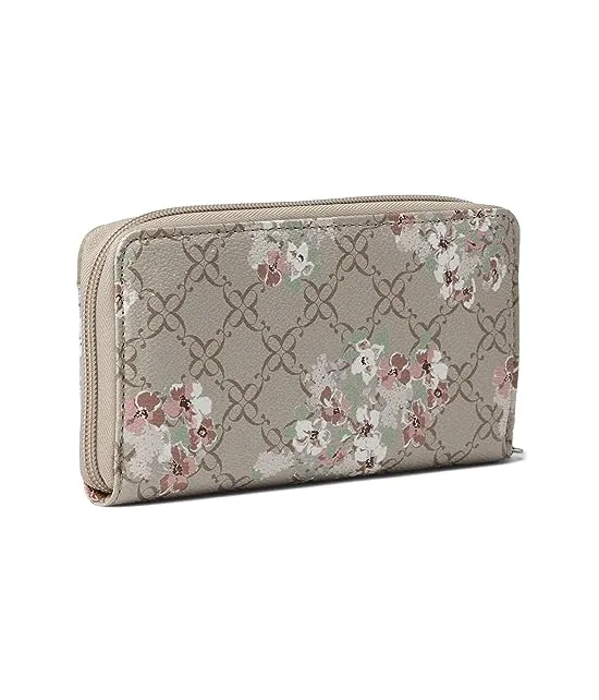 https://images.styletyx.com/images/wildwood-slg-zip-around-bifold-wallet-nine-west-13243357_2.webp
