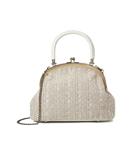 https://images.styletyx.com/images/willow-top-handle-frame-bag-patricia-nash-12946759_1.webp