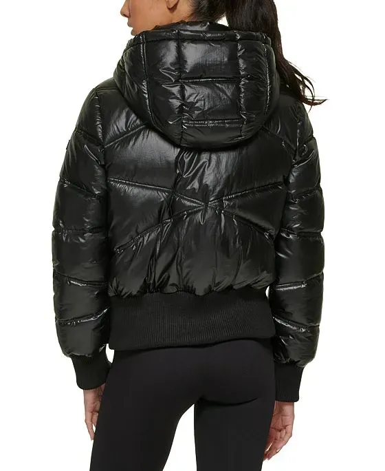 https://images.styletyx.com/images/women-s-knitted-hem-hooded-puffer-coat-dkny-13698863_2.webp