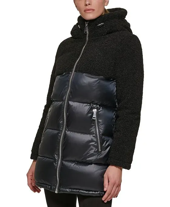 https://images.styletyx.com/images/women-s-mixed-media-hooded-puffer-coat-calvin-klein-3282841_1.webp