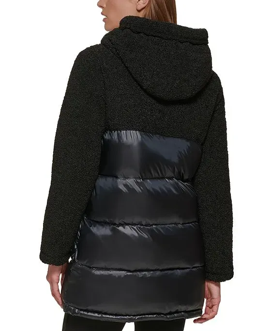 https://images.styletyx.com/images/women-s-mixed-media-hooded-puffer-coat-calvin-klein-3282841_2.webp