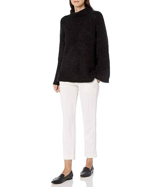 https://images.styletyx.com/images/women-s-moving-rib-turtleneck-theory-1504072110_3.webp