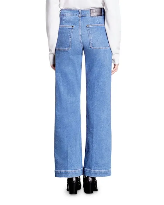 https://images.styletyx.com/images/worker-mid-rise-jeans-in-blue-denim-the-kooples-1906531755_2.webp