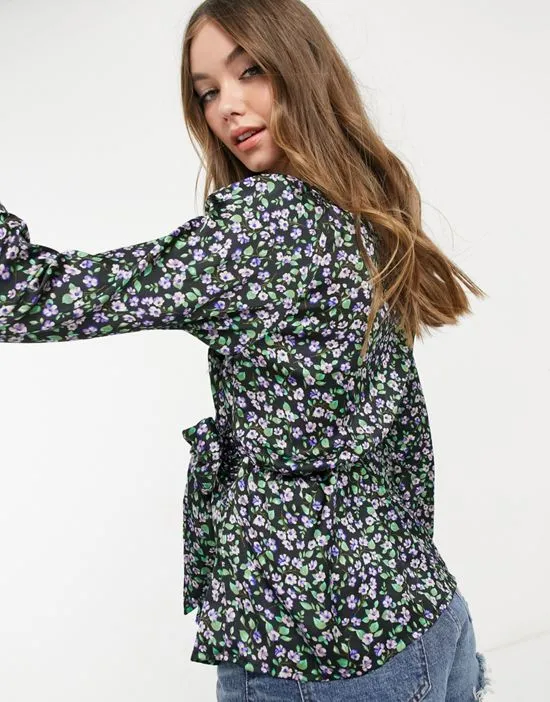 https://images.styletyx.com/images/wrap-blouse-with-puff-sleeves-and-deep-cuffs-in-purple-floral-vero-moda-1161549167_2.webp