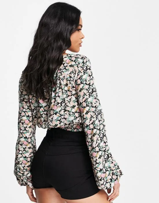 https://images.styletyx.com/images/wrap-cropped-blouse-in-dark-floral-ax-paris-2769956_2.webp