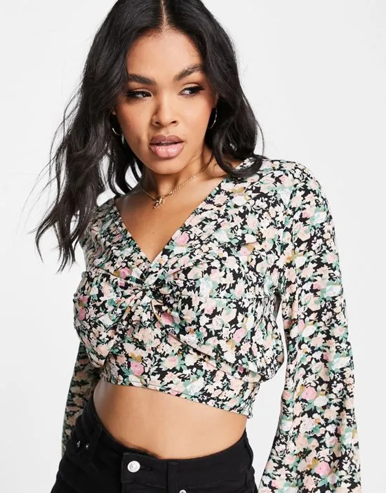 https://images.styletyx.com/images/wrap-cropped-blouse-in-dark-floral-ax-paris-2769956_3.webp