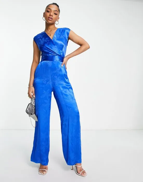 https://images.styletyx.com/images/wrap-front-satin-jacquard-jumpsuit-in-cobalt-floral-closet-london-1753798_1.webp