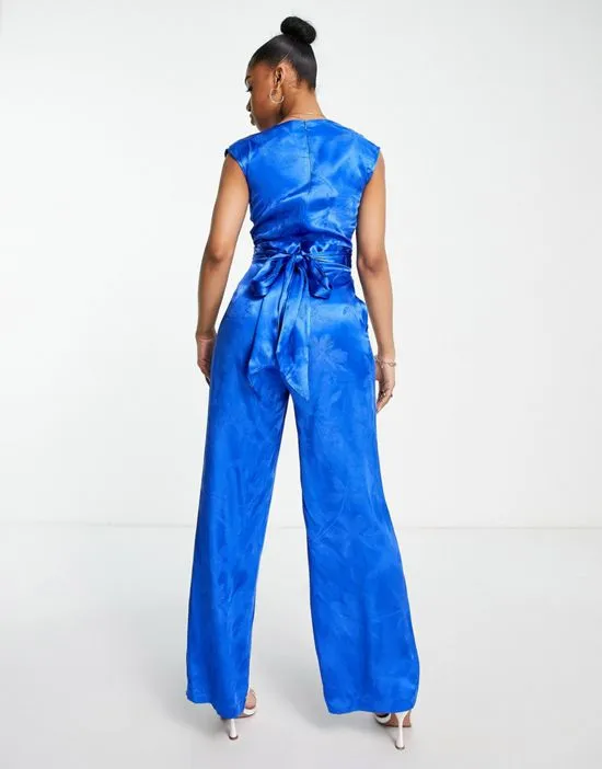 https://images.styletyx.com/images/wrap-front-satin-jacquard-jumpsuit-in-cobalt-floral-closet-london-1753798_2.webp