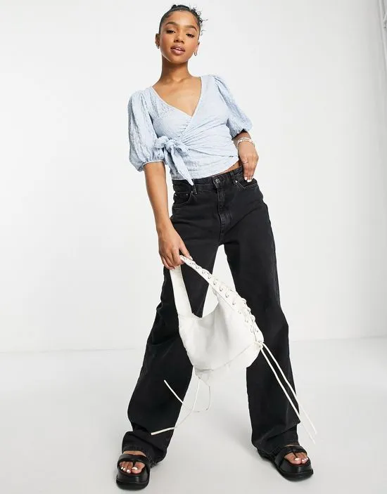https://images.styletyx.com/images/wrap-side-blouse-in-dusty-blue-monki-1867130_3.webp