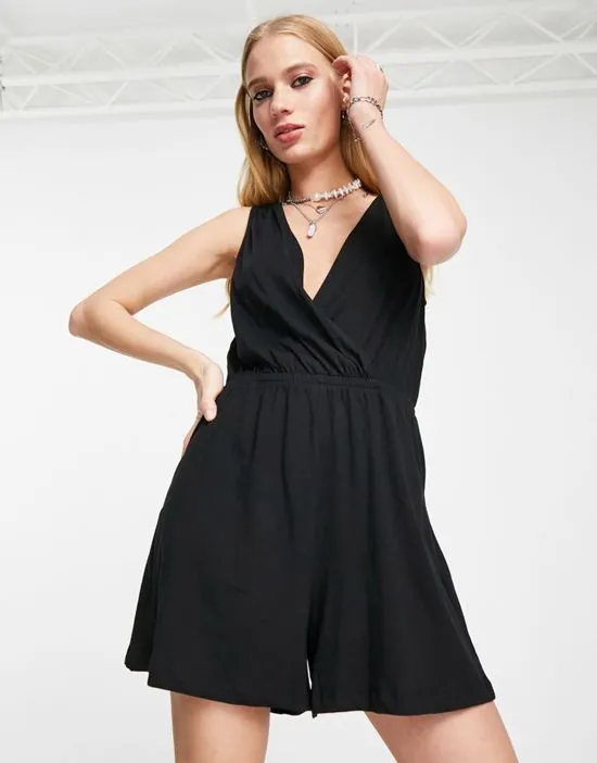https://images.styletyx.com/images/wrap-sleeveless-romper-in-black-only-1753421_3.webp