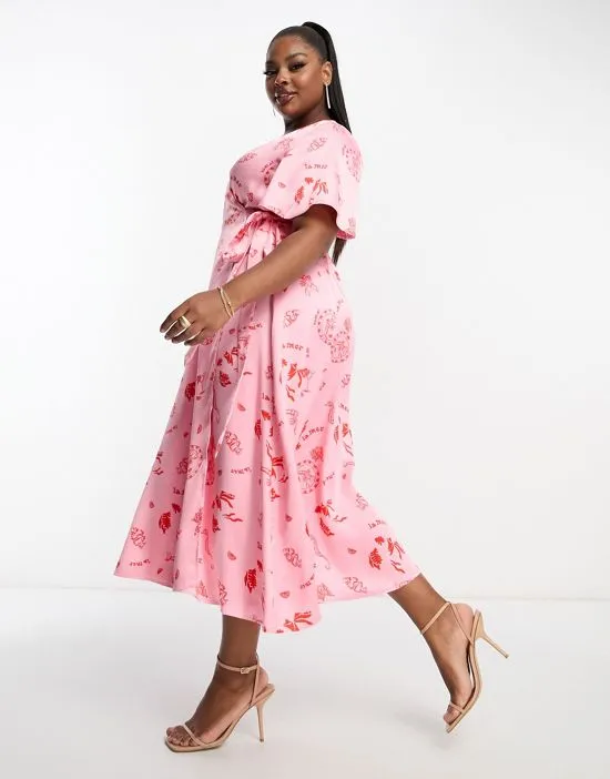 https://images.styletyx.com/images/wrap-tie-midi-dress-in-pink-la-mer-print-never-fully-dressed-plus-600391686_2.webp