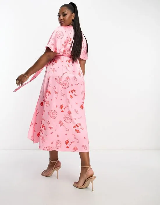 https://images.styletyx.com/images/wrap-tie-midi-dress-in-pink-la-mer-print-never-fully-dressed-plus-600391686_4.webp