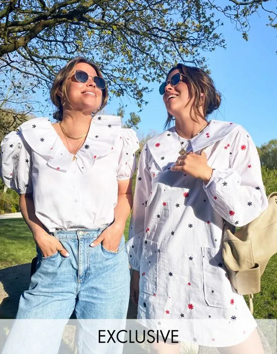 https://images.styletyx.com/images/x-collyer-twins-relaxed-shirt-with-volume-sleeves-and-frill-collar-in-poplin-labelrail-1890621_1.webp