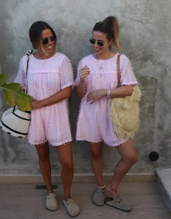 https://images.styletyx.com/images/x-collyer-twins-textured-romper-in-baby-pink-labelrail-2718077_1.webp