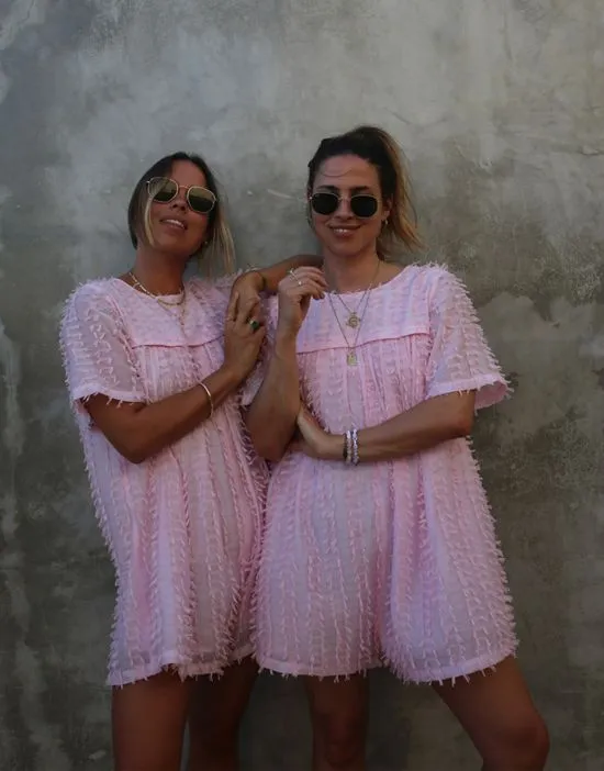 https://images.styletyx.com/images/x-collyer-twins-textured-romper-in-baby-pink-labelrail-2718077_2.webp