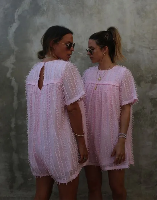 https://images.styletyx.com/images/x-collyer-twins-textured-romper-in-baby-pink-labelrail-2718077_3.webp