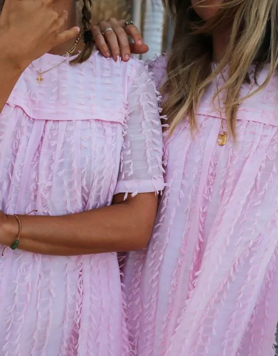 https://images.styletyx.com/images/x-collyer-twins-textured-romper-in-baby-pink-labelrail-2718077_4.webp