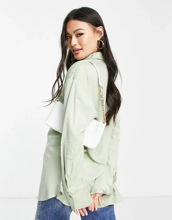 https://images.styletyx.com/images/x-lovisa-wallin-linen-oversized-shirt-in-light-green-part-of-a-set-na-kd-1888639_2.webp