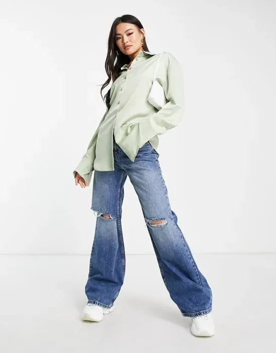 https://images.styletyx.com/images/x-lovisa-wallin-linen-oversized-shirt-in-light-green-part-of-a-set-na-kd-1888639_4.webp