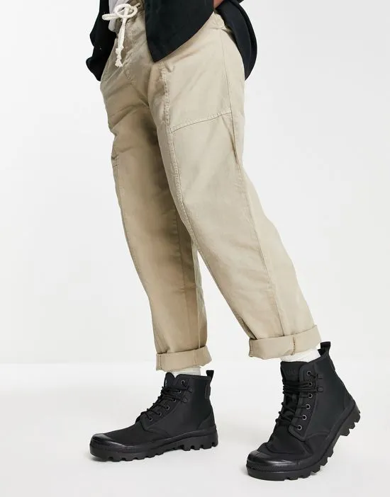 https://images.styletyx.com/images/x-palladium-pampa-rains-boots-in-black-rains-3118024_4.webp