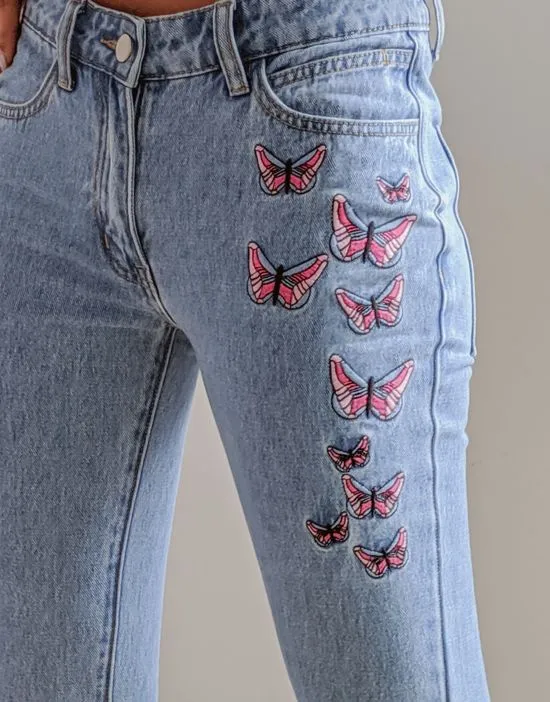 https://images.styletyx.com/images/x-pose-and-repeat-mid-rise-90s-flared-jeans-with-butterfly-appliques-in-blue-labelrail-13286485_2.webp