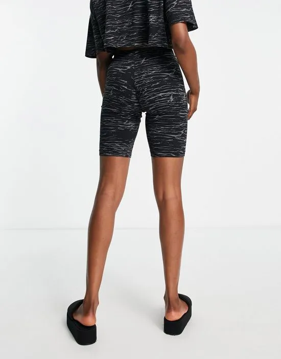 https://images.styletyx.com/images/x-stranger-things-upside-down-legging-shorts-in-black-gray-quiksilver-2490194_3.webp