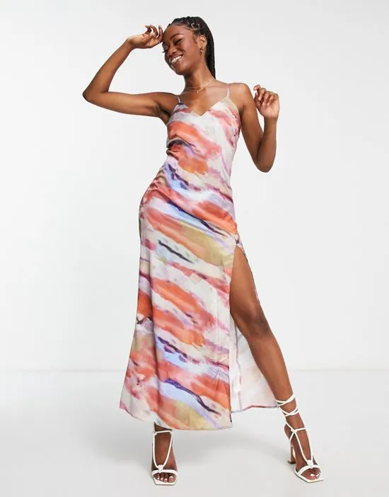 https://images.styletyx.com/images/x-yasmin-devonport-exclusive-satin-plunge-front-maxi-dress-in-multi-abstract-print-in-the-style-3241061_1.webp