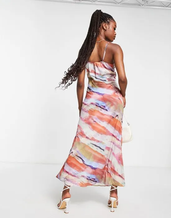 https://images.styletyx.com/images/x-yasmin-devonport-exclusive-satin-plunge-front-maxi-dress-in-multi-abstract-print-in-the-style-3241061_3.webp